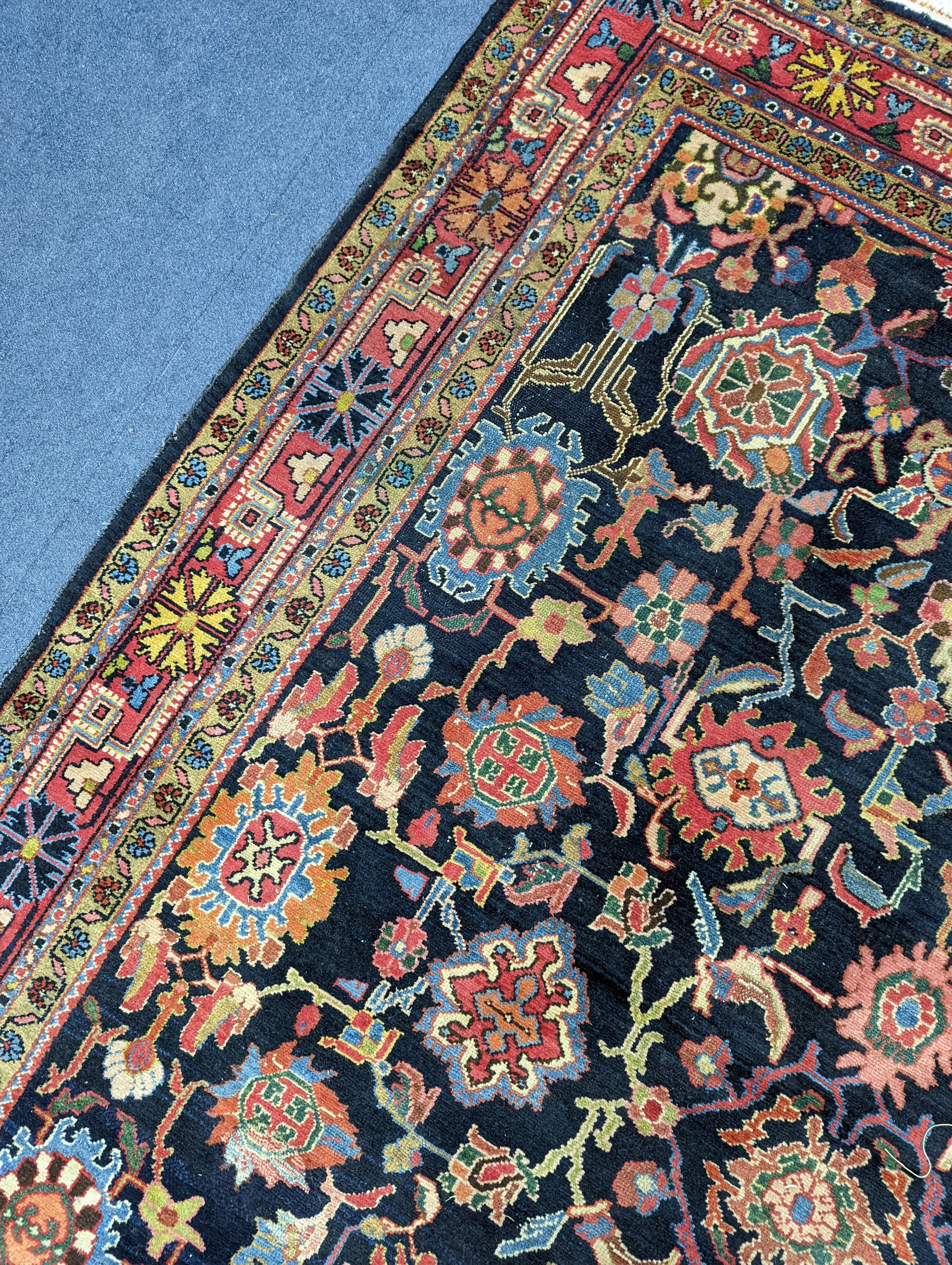 A Heriz / Moghal blue ground carpet, 340 x 206cm